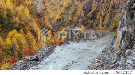 golden autumn landscape between the rocky mountains in Georgia. Stone road. Europe 45662397
