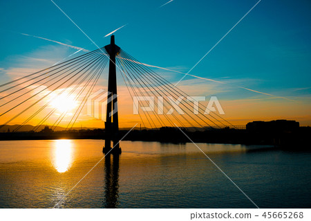 Cute sunset with Donaustadt bridge in Vienna, Austria. Cute sunset with Donaustadt bridge in Vienna, Austria. 45665268