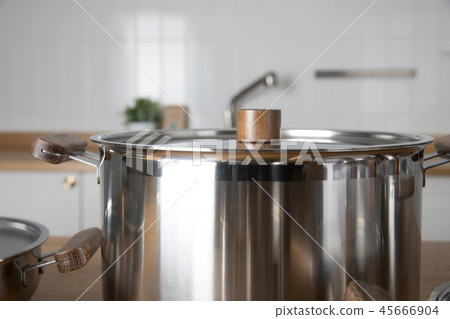 Stainless steel pot in the kitchen Stainless steel pot in the kitchen 45666904
