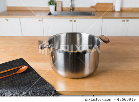 Stainless steel pot in the kitchen Stainless steel pot in the kitchen 45666919