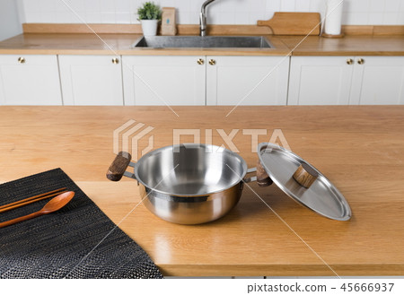 Stainless steel pot in the kitchen Stainless steel pot in the kitchen 45666937