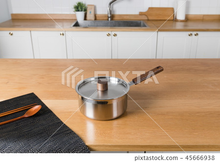 Stainless steel pot in the kitchen Stainless steel pot in the kitchen 45666938