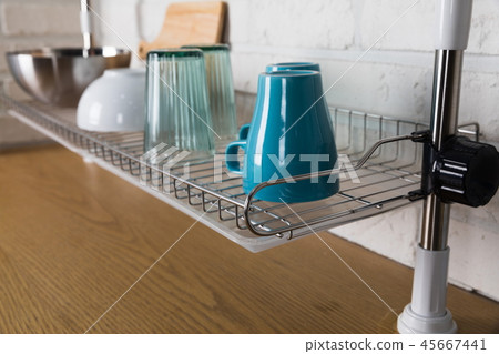 Image of dishwasher with kitchen utensils, kitchen with white background 45667441