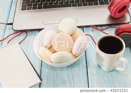 open laptop with white Cup of coffee 45673181