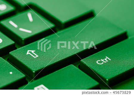 Keyboard keys close up, shift key and ctrl, IT background, green toning 45673829