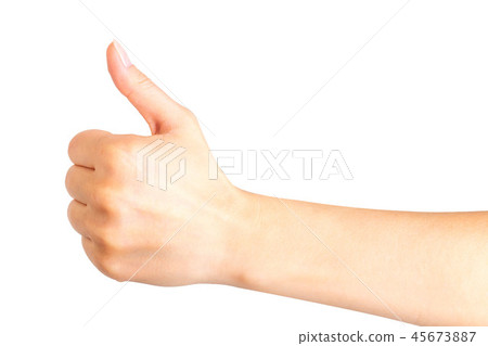 Woman holding hand in gesture of like sign, giving thumb up 45673887