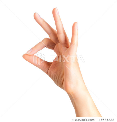 Woman hand holding something with two fingers 45673888