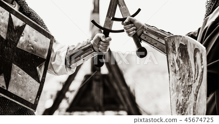 traditional medieval knights with shields and swords traditional medieval knights with shields and swords 45674725