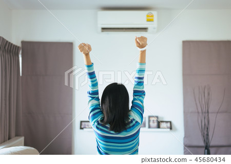 Happy fresh woman hands up and standing 45680434