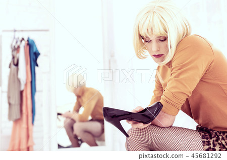 Appealing upset transgender wearing blond short wig 45681292