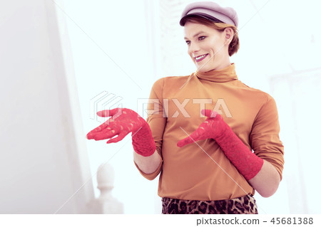 Joyful smiling transgender talking to himself being at home Joyful smiling transgender talking to himself being at home 45681388