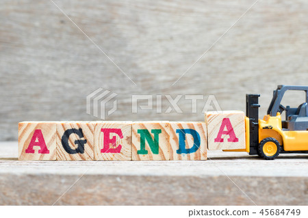 Toy forklift hold letter block a to word agenda Toy forklift hold letter block a to word agenda 45684749