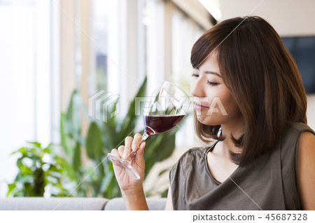 Young woman wine woman alcohol red wine liquor Young woman wine woman alcohol red wine liquor 45687328