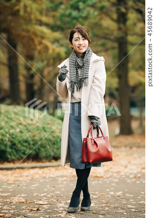 Japanese women wearing a coat Japanese women wearing a coat 45689042