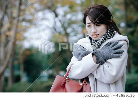 Japanese woman in a coat cold chills chills chills 45689136