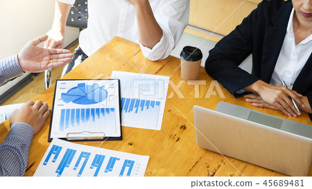 Business Team Meeting Using Laptop Discussion together while goi 45689481