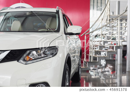 The headlights and the hood of a new luxury car. The headlights and the hood of a new luxury car. 45691378