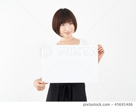 Woman with white board at white background 45691486