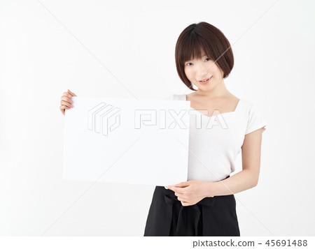 Woman with white board at white background 45691488