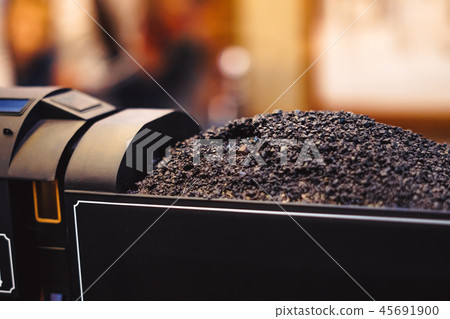 model of an old toy train with coal 45691900
