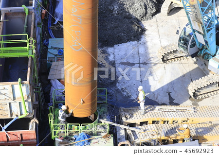 Construction site: Foundation work: Guide pipes and rebar connection work Construction site: Foundation work: Guide pipes and rebar connection work 45692923