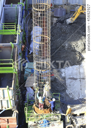 Construction site: Foundation work: Guide pipes and rebar connection work Construction site: Foundation work: Guide pipes and rebar connection work 45692927