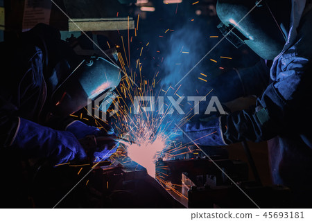 Industrial worker ar welding repair his work Industrial worker ar welding repair his work 45693181