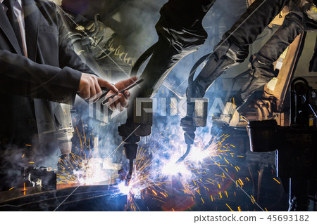 businessman is used smart phone control robot 45693182