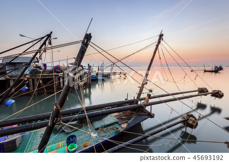 fishing boat at harbor with sunset fishing boat at harbor with sunset 45693192