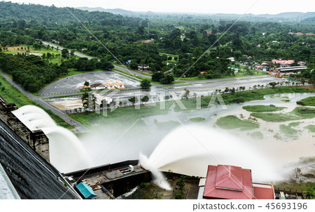 Water spills over the top of Dam 45693196