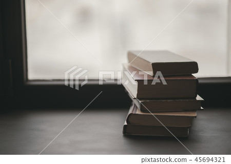 Books on the window 45694321