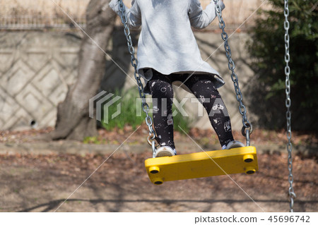 Girl on a swing 45696742