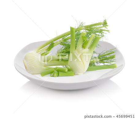 Fennel on plate isolated on white background. 45699451