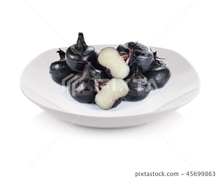 water nut and plate on white background 45699863