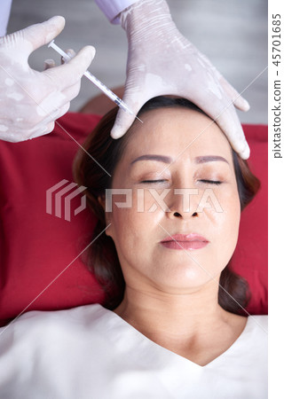 Forehead botox injection Forehead botox injection 45701685