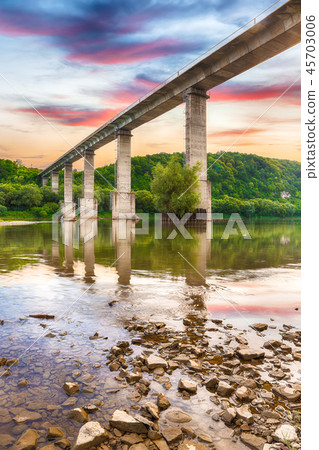 arch bridge built over Dnister river in Ukraine. arch bridge built over Dnister river in Ukraine. 45703006
