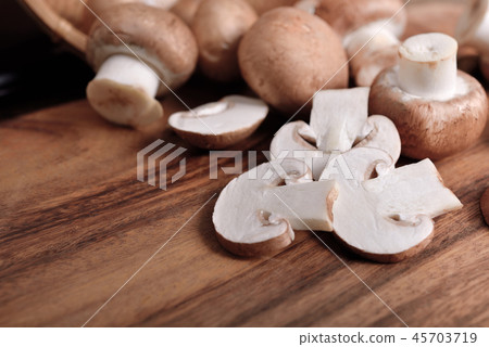 whole and sliced fresh champignon mushroom 45703719