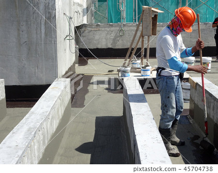 Waterproofing membrane applied by workers 45704738