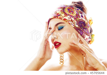 young pretty modern girl with bright shawl on head emotional pos 45705644