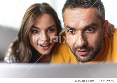Lovely guy and girl are very surprised Lovely guy and girl are very surprised 45706629