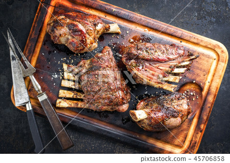 Barbecue Leg of Lamb and Veal Loin as top view Barbecue Leg of Lamb and Veal Loin as top view 45706858