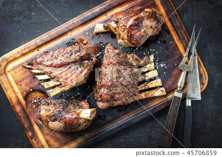 Barbecue Leg of Lamb and Veal Loin as top view Barbecue Leg of Lamb and Veal Loin as top view 45706859