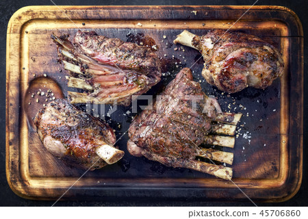 Barbecue Leg of Lamb and Veal Loin as top view Barbecue Leg of Lamb and Veal Loin as top view 45706860
