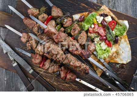 Traditional Shashlik with Salad and Yufka Bread Traditional Shashlik with Salad and Yufka Bread 45706865