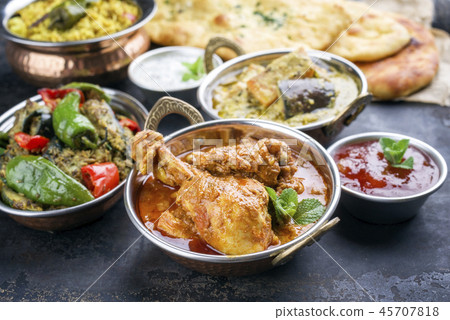 Traditional Indian Curries and Biryani with Mango Traditional Indian Curries and Biryani with Mango 45707818