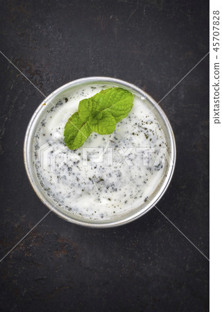 Traditional Indian Raita with Dahi as close-up in Traditional Indian Raita with Dahi as close-up in 45707828