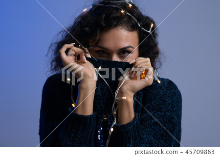 Young woman with xmas glowing lights Celebration, Christmas, New Year, Birthday 45709863