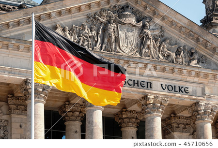 Germany Politics Concept: German Flag In Front of The Reichstag Building 45710656