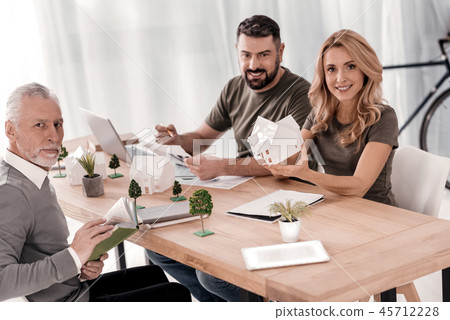 Cheerful ecologists working on their project Cheerful ecologists working on their project 45712228
