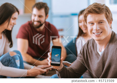 Happy jolly man using application Happy jolly man using application 45713509